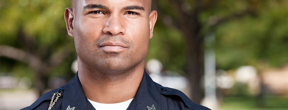 Law enforcement officer using a breathalyzer